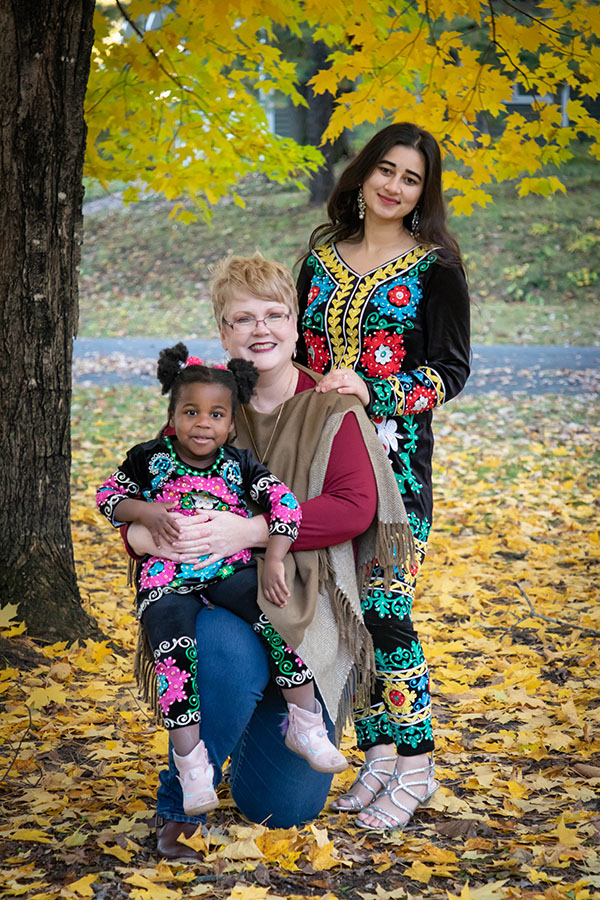​​Glenda Jones, center, with her daughter, Audrey, and Umarova, at right, wanted to make a difference in Umarova’s life by helping her attend UW-Stout. / Photo courtesy of Laura Giammattei, Gemstone Photography LLC