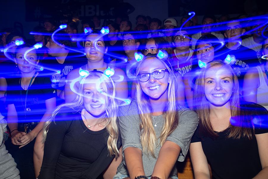 Blue Devil horns of light swirl around students Sept. 1 during the Blue Rah celebration at UW-Stout to welcome first-year students to campus. Enrollment for first-year students is up 6.7% this fall.