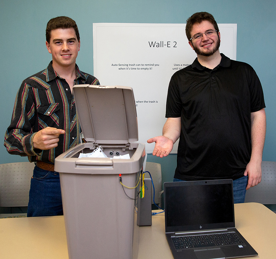 UW-Stout first-year students Trevor Valdez, at left, and Bryant Ehlers designed a garbage can that closes when it is full.