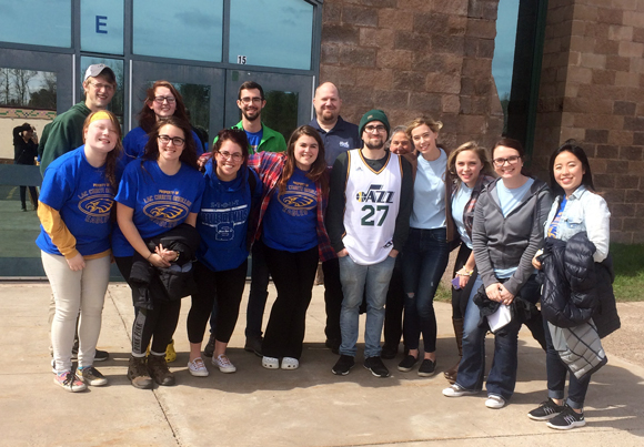 Students from the LCO Ojibwe school try an environmental science experiment in May while visiting UW-Stout.UW-Stout students, including Noelle Metoxen front left, in the Today and Beyond program gather in front of the LCO Ojibwe school in Hayward.