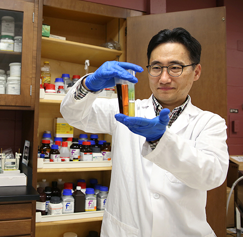 Assistant Professor Taejo Kim works in UW-Stout’s food science lab.
