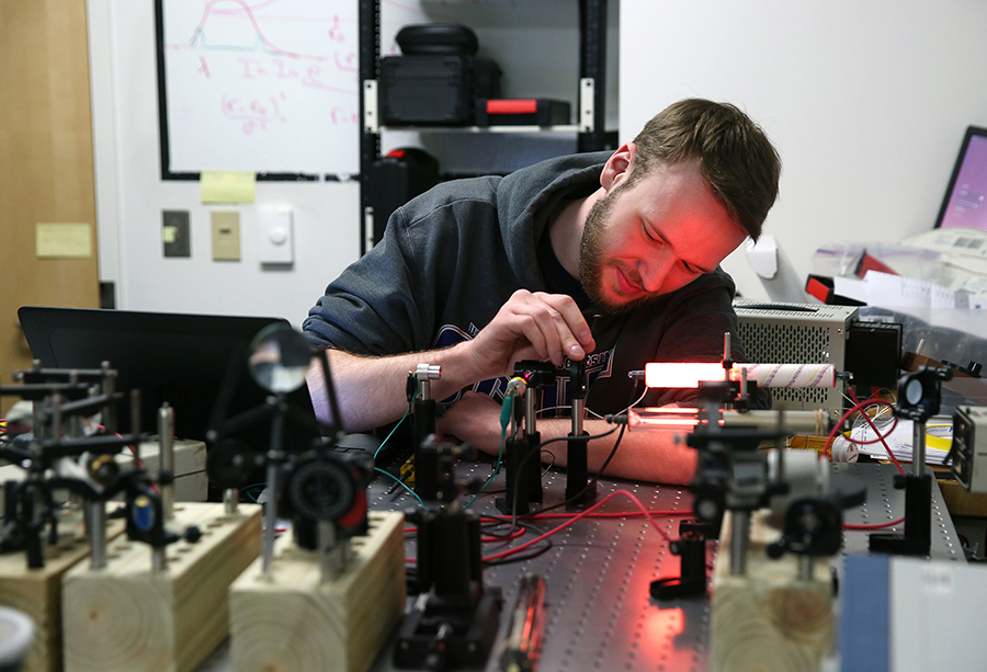 A student conducts research in the UW-Stout physics lab.