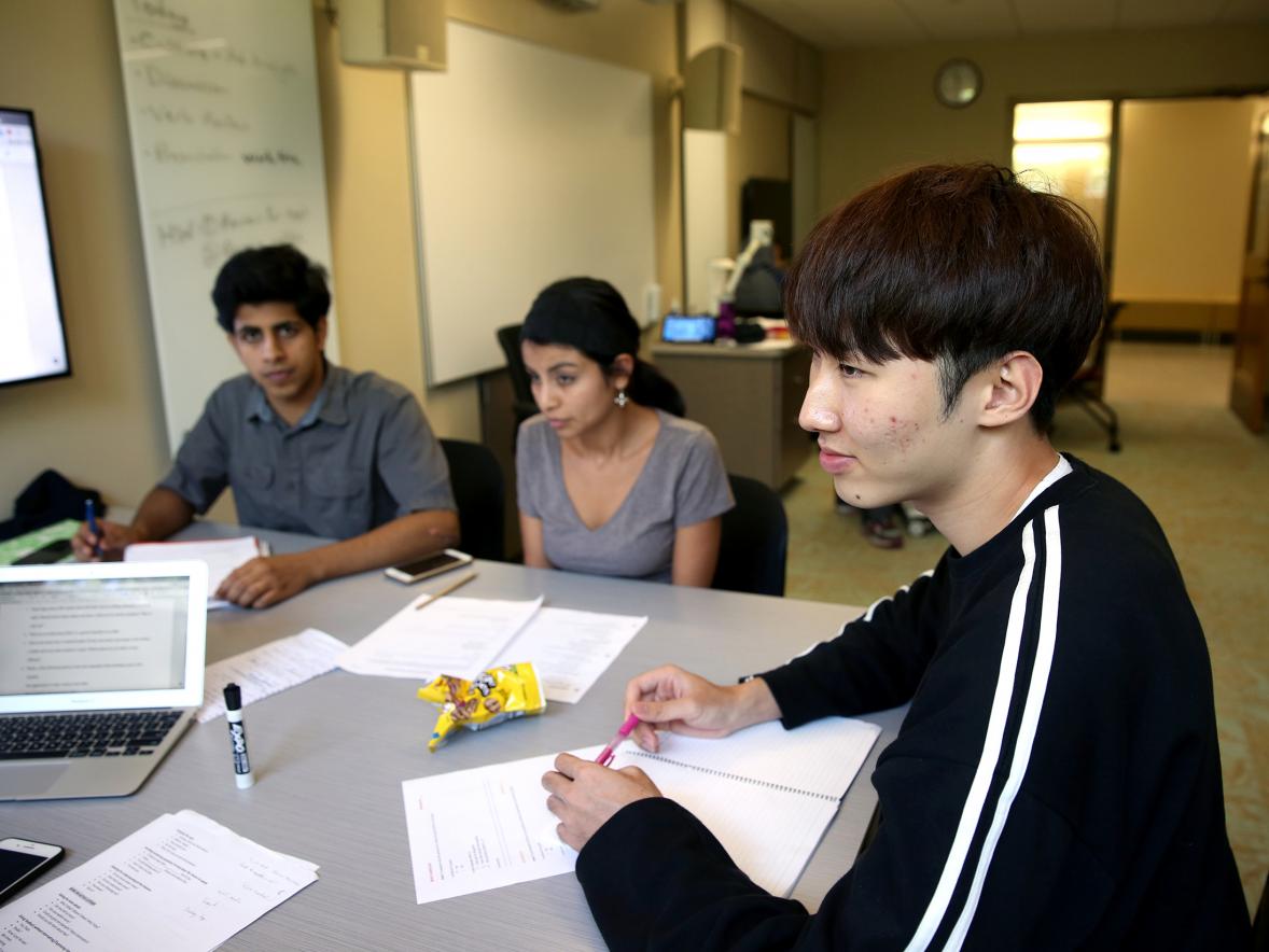 Minje Kwon, right, from Seoul, South Korea, attends an English as a second language class this summer.